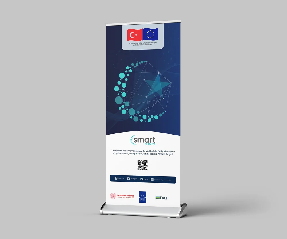 Roll-up banner on a pale floor, dark blue with a node network graphic and the programme wordmark at the top.
