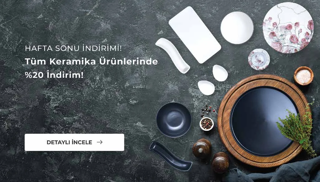 Dark weekend-discount banner with tableware arranged on slate, and a call to action.