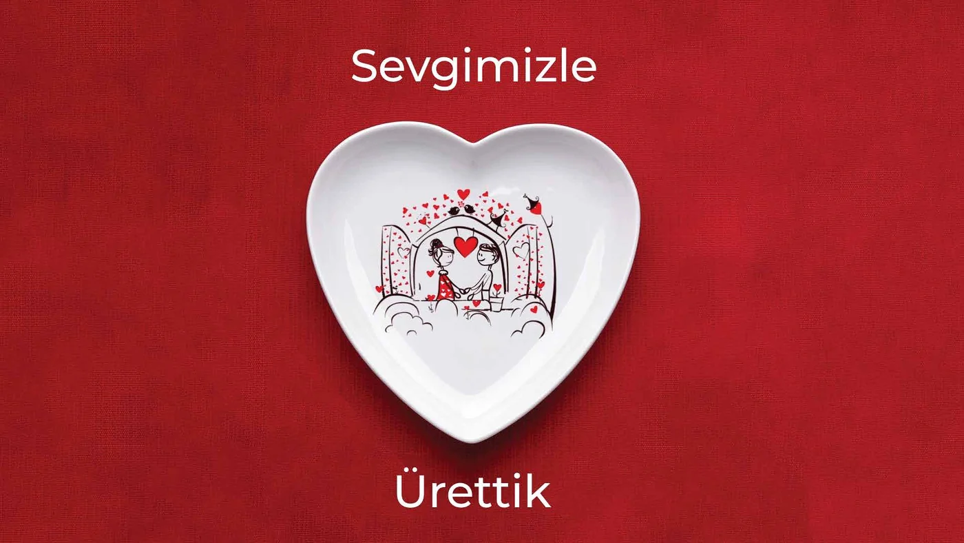 Red frame with a white heart-shaped dish at the centre and the line 'Sevgimizle Ürettik'.